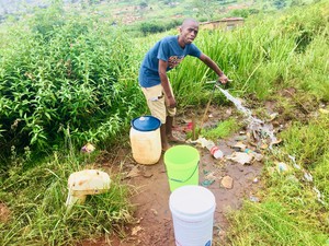 Photo of a man at a standpipe