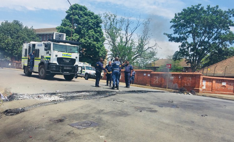 Photo of police truck in road