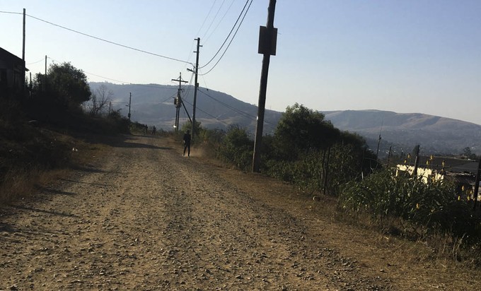 Photo of gravel road into eGoqweni