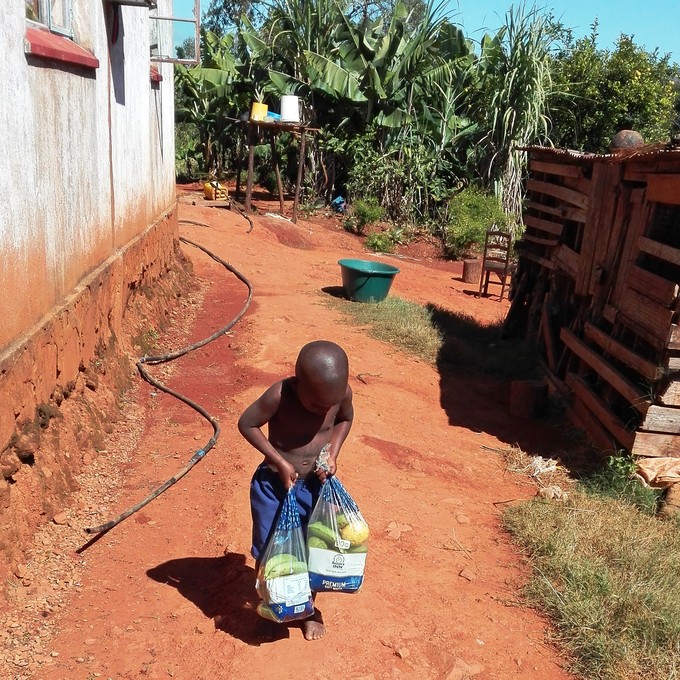 Photo of a child with a bag