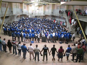 Photo of people in a prayer meeting