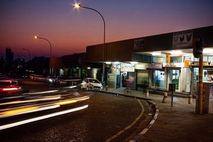 Photo of a street at night