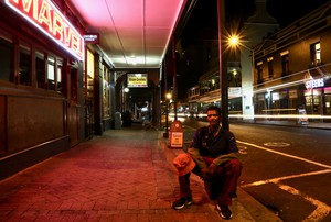 Photo of an empty street at night