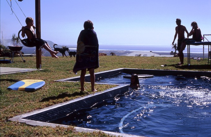 Photo of kids playing at swimming pool.