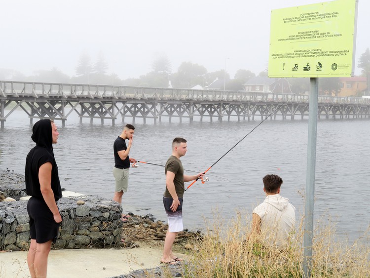 Photo of people fishing at Milnerton lagoon