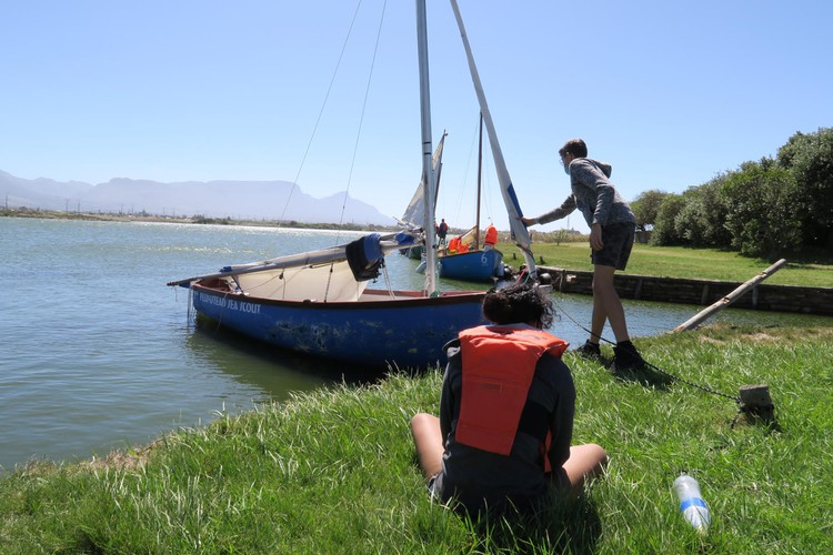 Photo of people with a boat