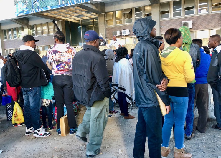 Photo of queuing people