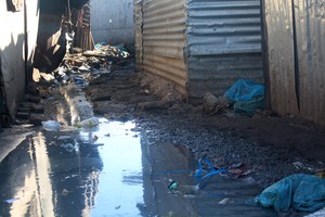 Photo of shacks in water