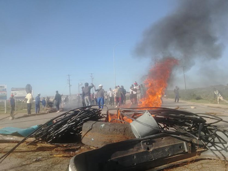 Photo of burning barricades in road