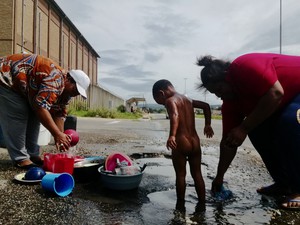 Photo of two women and a child