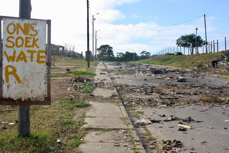 Photo of a rubble strewn road