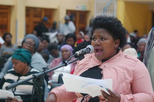 Photo of woman speaking at meeting