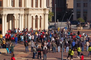 Photo of striking workers in front of city hall