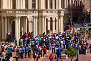 Photo of workers gathered