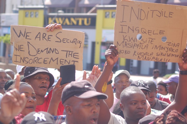 Photo of marching security guards