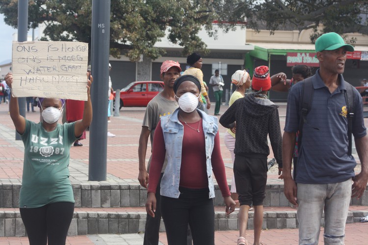 Photo of people picketing outside SASSA