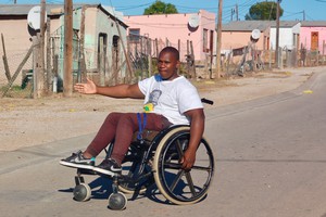 Photo of a man in a wheelchair