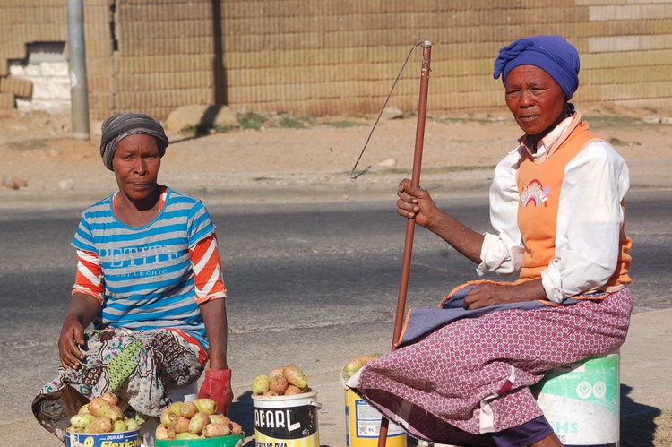 Photo of two women with prickly pears