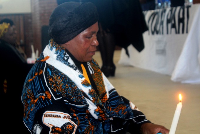 Photo of a woman with a candle