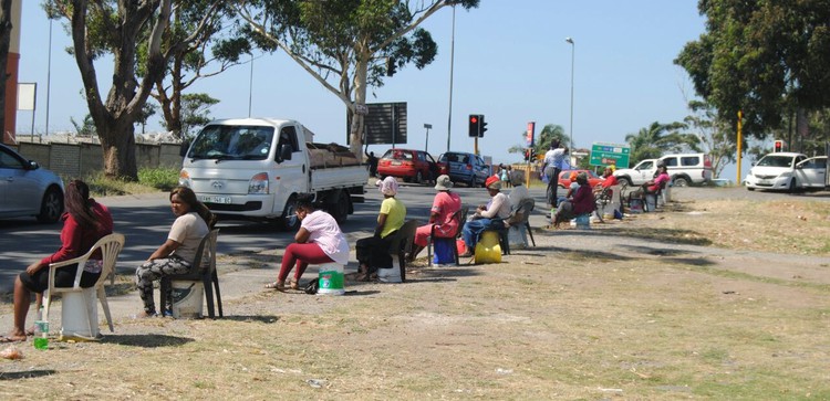 Photo of women waiting by a road