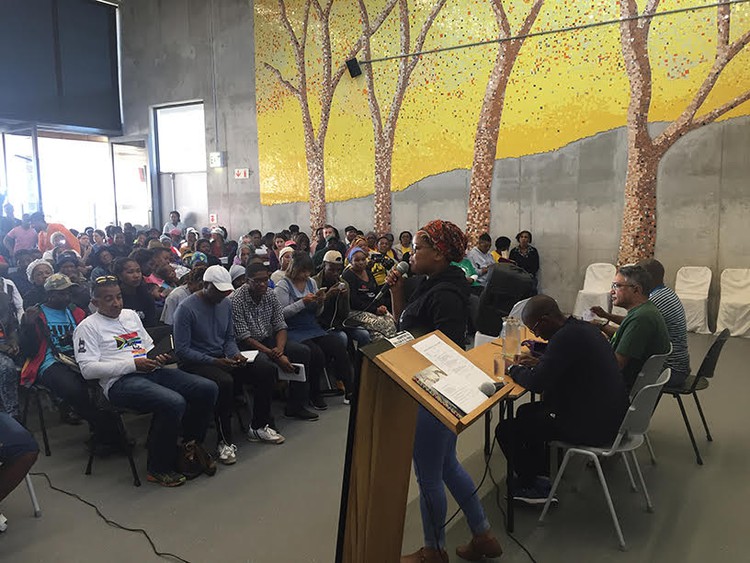 Photo of woman speaking at meeting