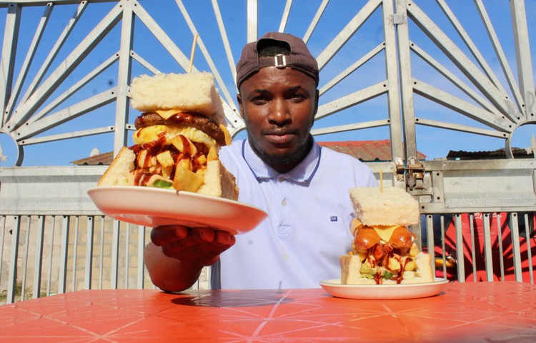 Photo of a man with dishes