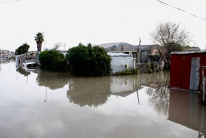 Photo of flooded shacks