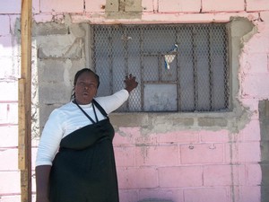 Photo of woman in front of shop