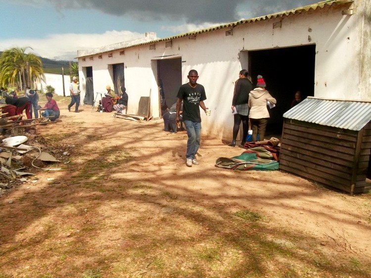 Photo of families moving into state owned farm