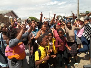 Photo of parents and children protesting