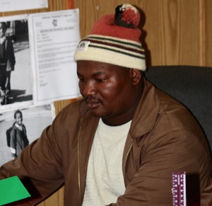 Photo of a man at a desk