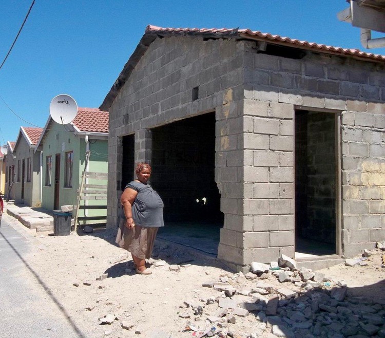 Photo of a house with bare walls