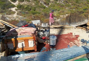 Photo of demolished shacks