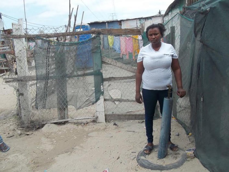 Photo of woman and broken tap