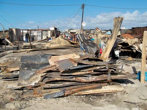 Photo of burnt shacks