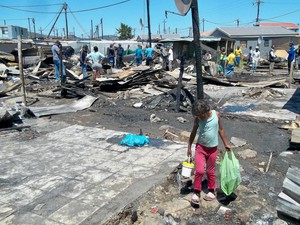 Photo of burnt shacks