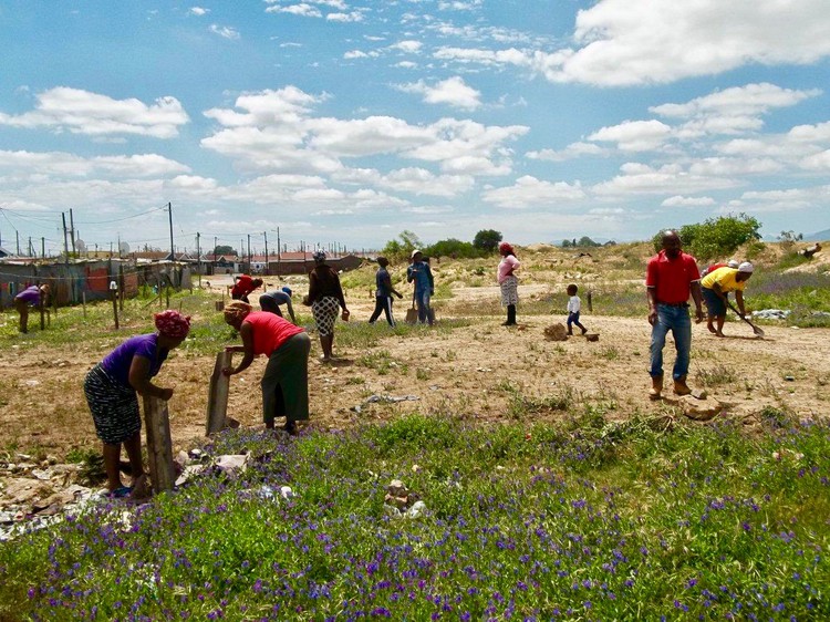 Photo of people in a field