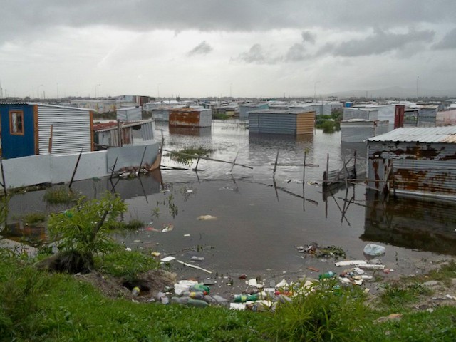 Photo of flooded shacks