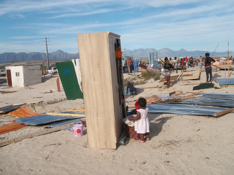 Photo of demolished shacks