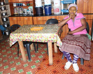 Photo of woman in shack