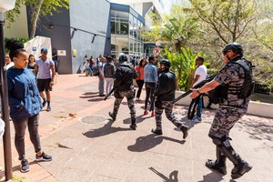 Photo of students and security