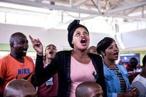 Photo of people mourning