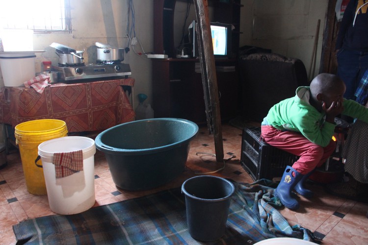 Photo of a child in a shack