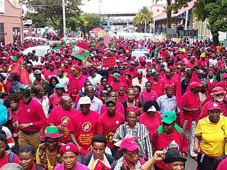 Photo of marchers in red