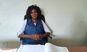 Photo of woman at desk