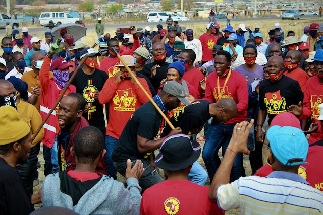 Photo of a group of union members in red t-shirts