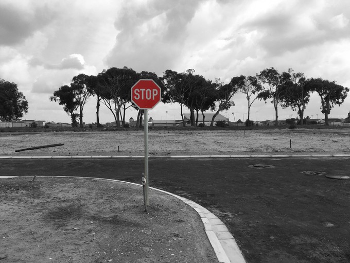 Photo of road with stop sign