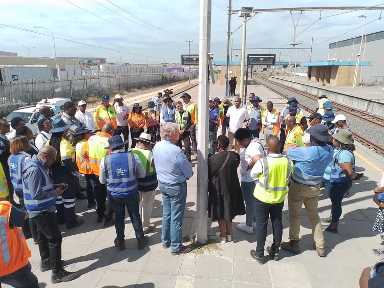 Photo of people on train station