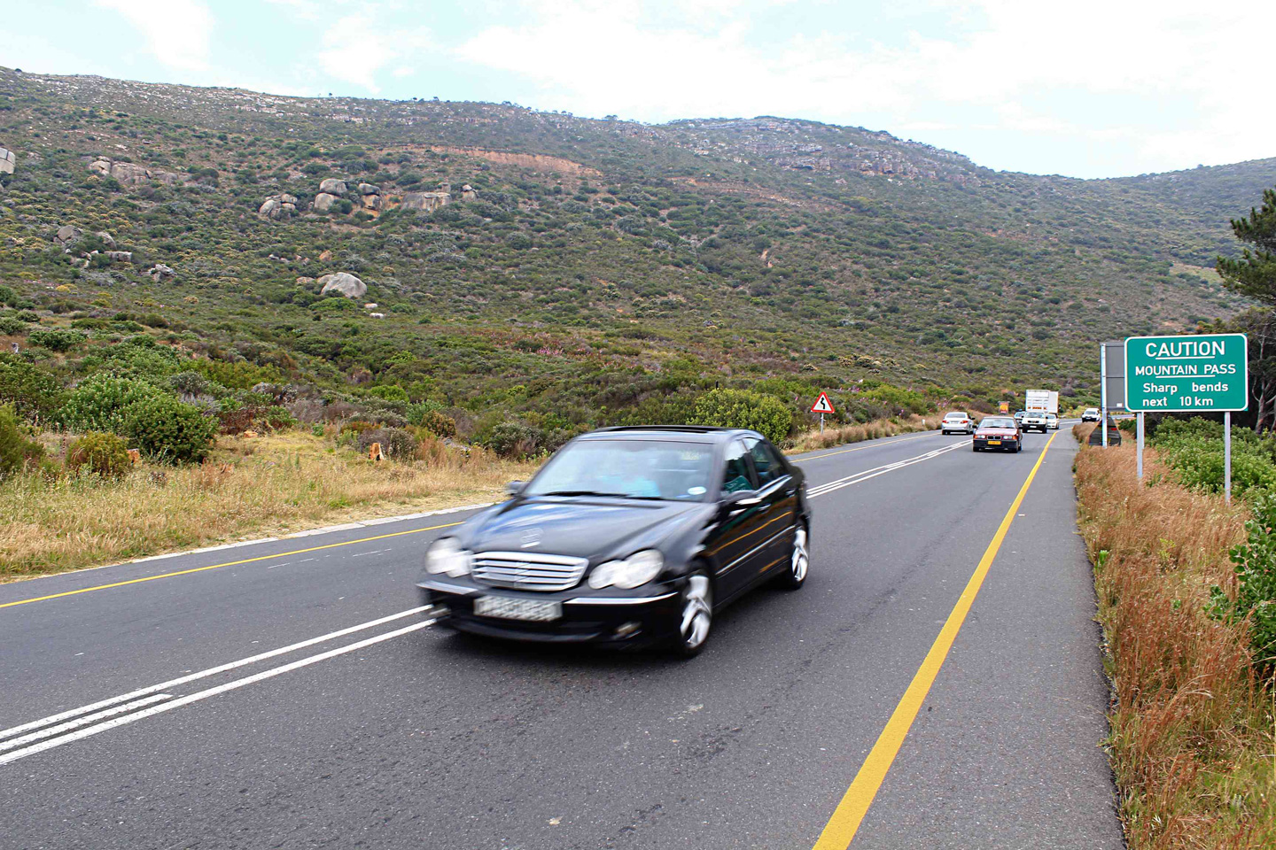 Every morning students have to hitchhike across Ou Kaapse Weg to get to a school far away. Yet there are better resourced schools a few kilometres from where they live.