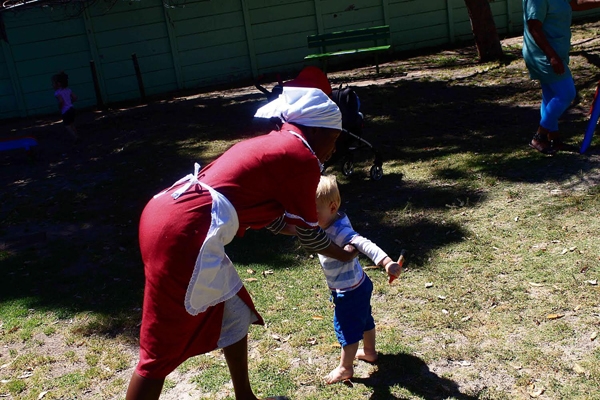 Photo of domestic worker and child